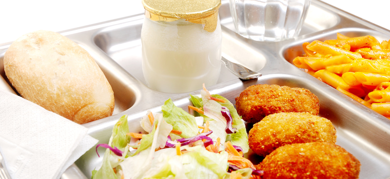 salad, milk, macaroni and cheese, and fritters on a school lunch tray